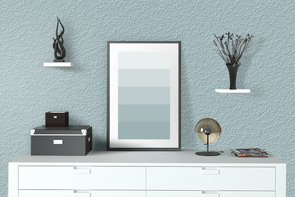 Pretty Photo frame on Clinical Soft Blue color drawing room interior textured wall