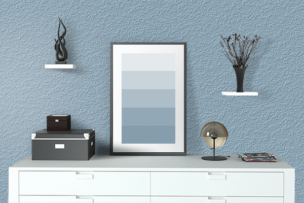 Pretty Photo frame on Relaxing Blue color drawing room interior textured wall