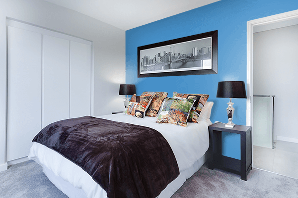 Pretty Photo frame on Deep King’s Blue color Bedroom interior wall color