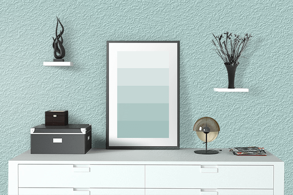 Pretty Photo frame on Bleached Aqua color drawing room interior textured wall