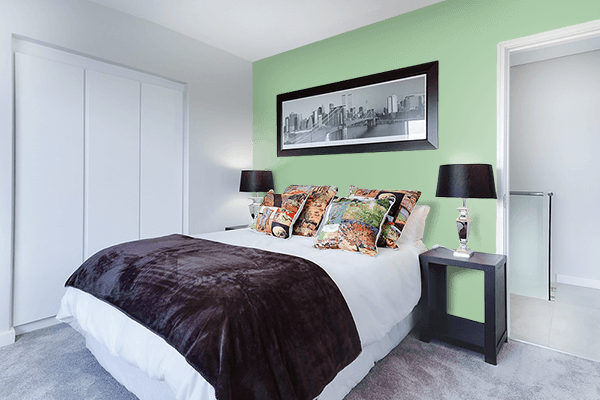 Pretty Photo frame on Serene Green color Bedroom interior wall color