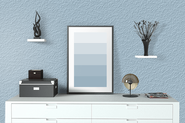 Pretty Photo frame on Himalaya Blue color drawing room interior textured wall