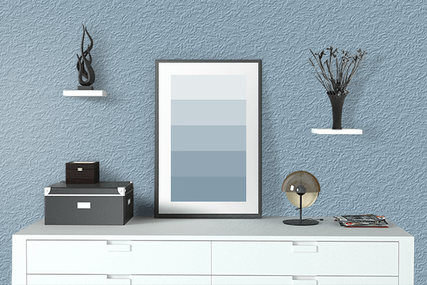 Pretty Photo frame on Chalk Blue color drawing room interior textured wall