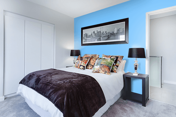 Pretty Photo frame on Bright Sky Blue color Bedroom interior wall color