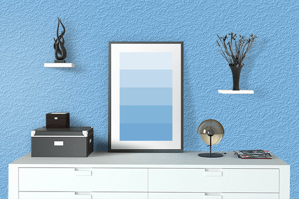 Pretty Photo frame on Bright Sky Blue color drawing room interior textured wall