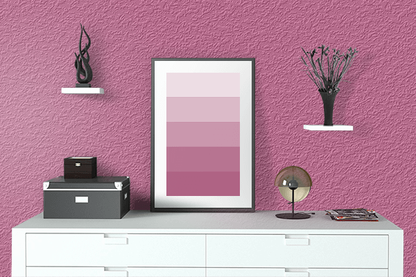 Pretty Photo frame on Ibis Rose color drawing room interior textured wall