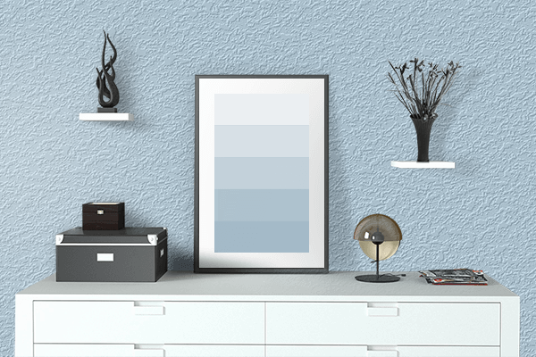 Pretty Photo frame on Diamond Soft Blue color drawing room interior textured wall