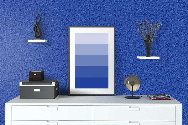 Pretty Photo frame on Savoy Blue color drawing room interior textured wall