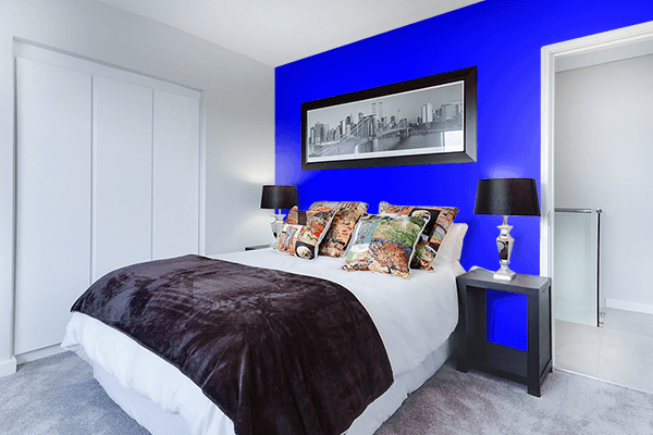 Pretty Photo frame on Vivid Blue color Bedroom interior wall color