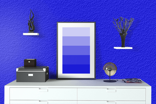 Pretty Photo frame on Vivid Blue color drawing room interior textured wall