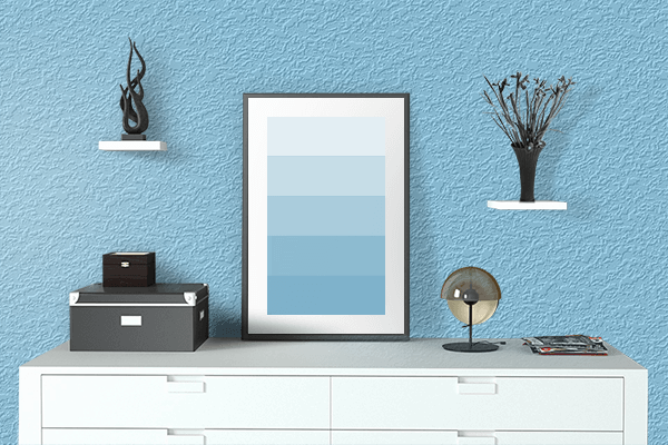 Pretty Photo frame on Baby Blue color drawing room interior textured wall