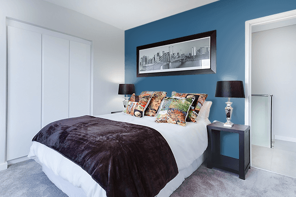Pretty Photo frame on Enamel Blue color Bedroom interior wall color