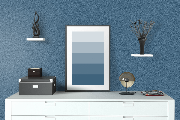 Pretty Photo frame on Enamel Blue color drawing room interior textured wall