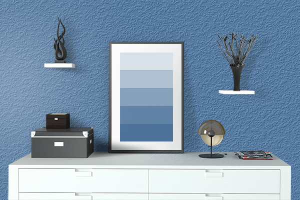 Pretty Photo frame on Metro Blue color drawing room interior textured wall