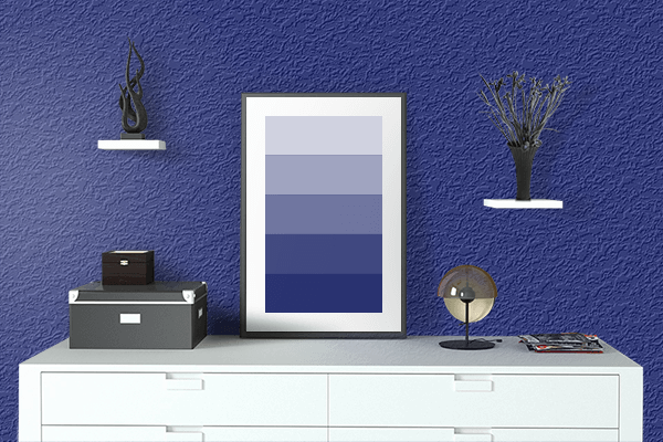 Pretty Photo frame on Bad Boy Blue color drawing room interior textured wall