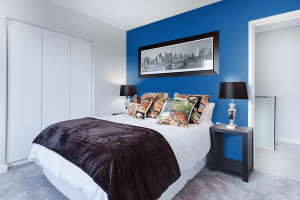 Pretty Photo frame on Tekhelet Blue color Bedroom interior wall color