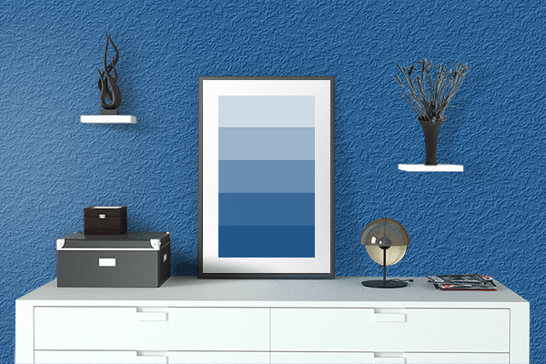 Pretty Photo frame on Tekhelet Blue color drawing room interior textured wall