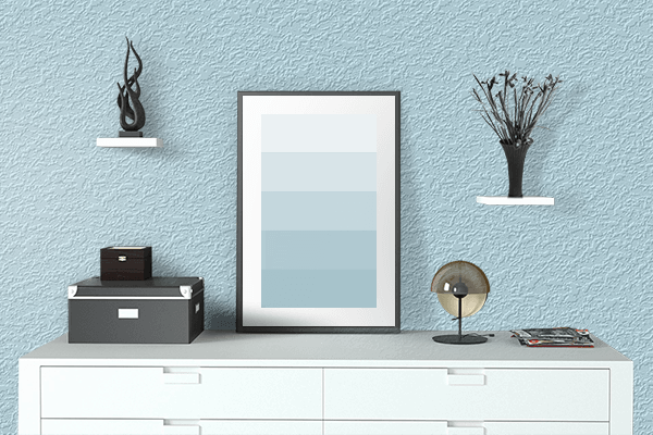 Pretty Photo frame on Spiritual Blue color drawing room interior textured wall