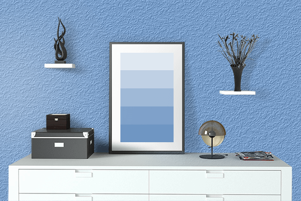 Pretty Photo frame on Flat Blue color drawing room interior textured wall