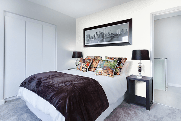 Pretty Photo frame on Diamond White color Bedroom interior wall color