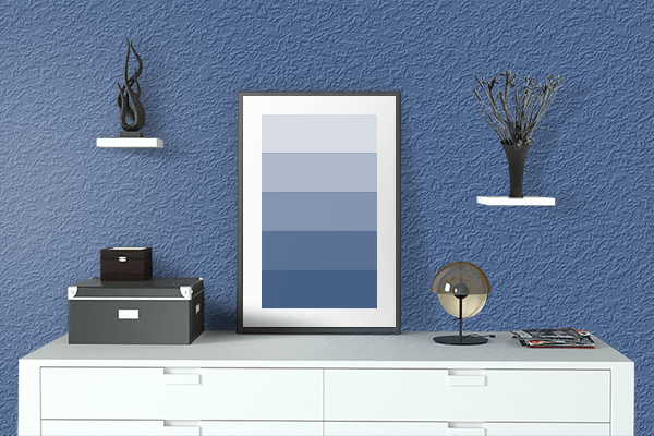 Pretty Photo frame on Portuguese Blue color drawing room interior textured wall