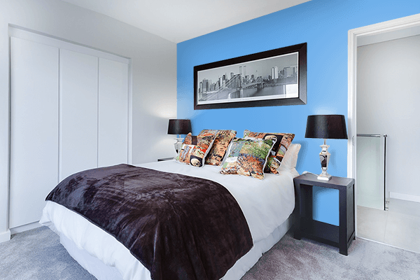 Pretty Photo frame on Ruddy Blue color Bedroom interior wall color
