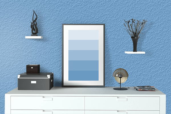 Pretty Photo frame on Argentinian Blue color drawing room interior textured wall
