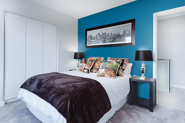 Pretty Photo frame on Sea Blue color Bedroom interior wall color