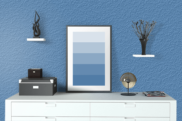 Pretty Photo frame on Jay Blue color drawing room interior textured wall