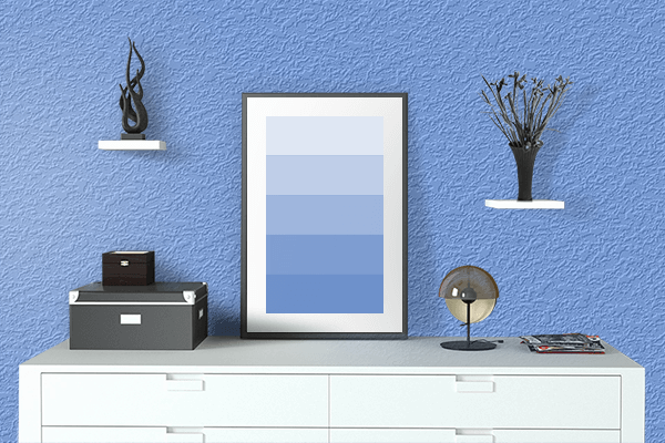 Pretty Photo frame on Heavenly Blue color drawing room interior textured wall
