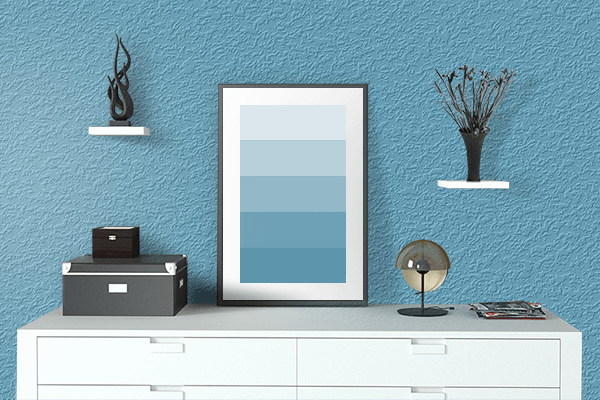 Pretty Photo frame on Fountain Blue color drawing room interior textured wall