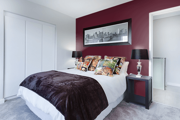 Pretty Photo frame on Intense Burgundy color Bedroom interior wall color