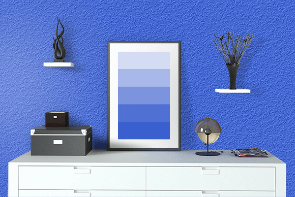 Pretty Photo frame on Radiant Blue color drawing room interior textured wall