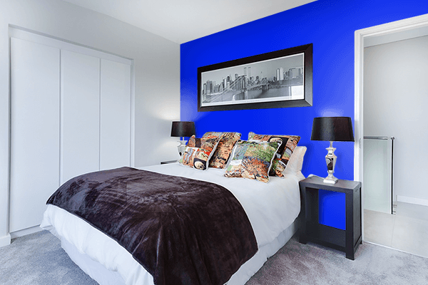 Pretty Photo frame on Vibrant Blue color Bedroom interior wall color