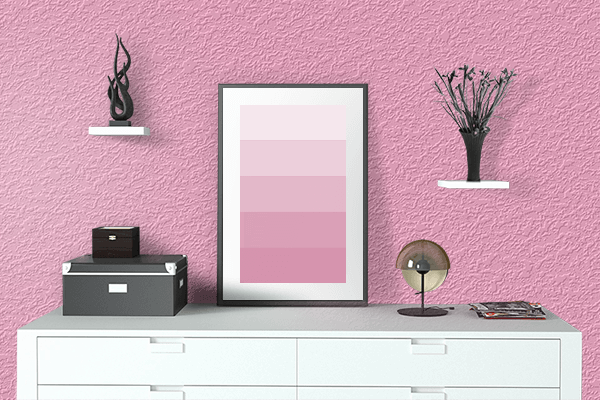 Pretty Photo frame on Carnation Pink color drawing room interior textured wall
