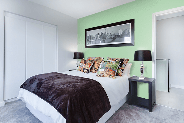 Pretty Photo frame on Green Tint color Bedroom interior wall color