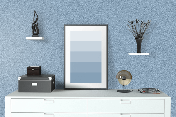 Pretty Photo frame on Airy Blue color drawing room interior textured wall