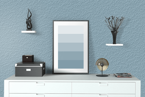 Pretty Photo frame on Bermuda Blue color drawing room interior textured wall