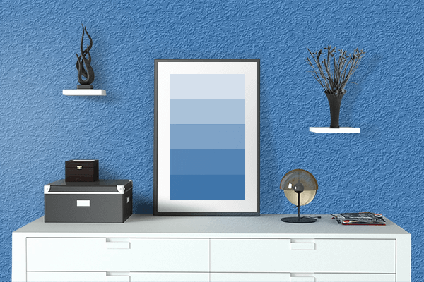 Pretty Photo frame on Mediterranean Blue color drawing room interior textured wall