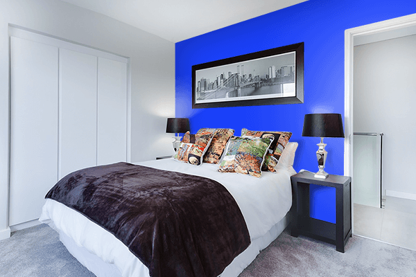 Pretty Photo frame on Bright Blue color Bedroom interior wall color