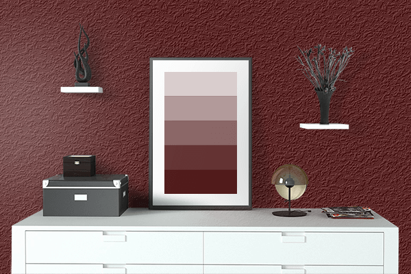 Pretty Photo frame on Oxblood color drawing room interior textured wall