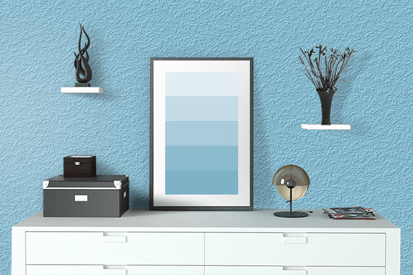Pretty Photo frame on Sky Blue color drawing room interior textured wall