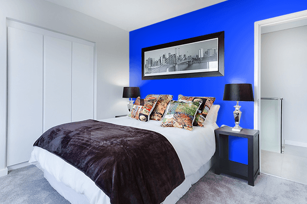 Pretty Photo frame on Psychedelic Blue color Bedroom interior wall color