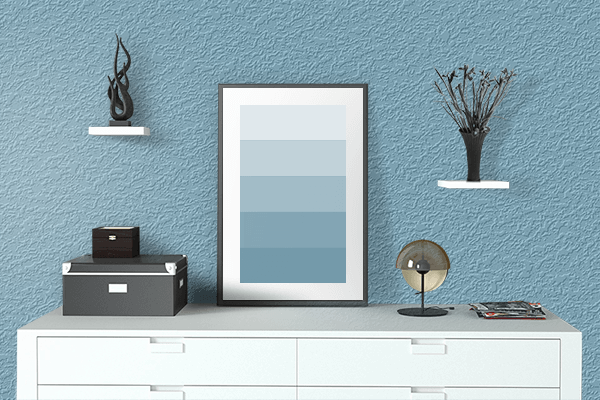 Pretty Photo frame on Matte Sky Blue color drawing room interior textured wall