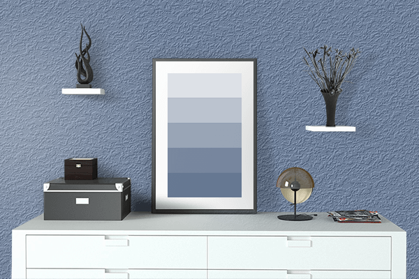 Pretty Photo frame on Dull Blue color drawing room interior textured wall
