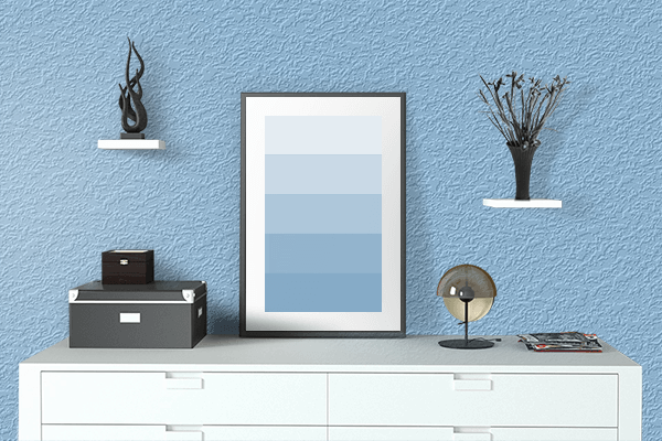 Pretty Photo frame on Sky Blue CMYK color drawing room interior textured wall
