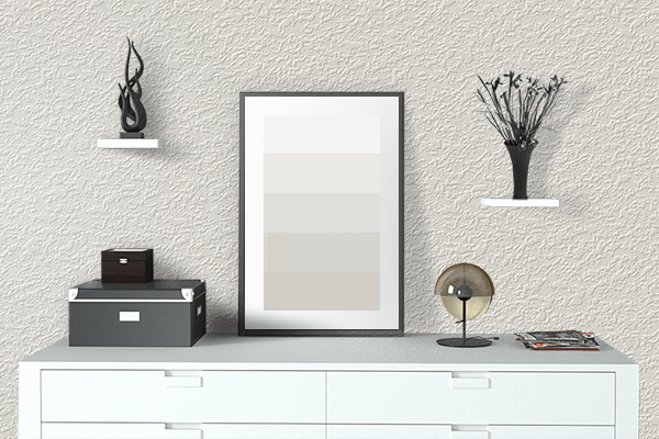 Pretty Photo frame on Muted Off White color drawing room interior textured wall