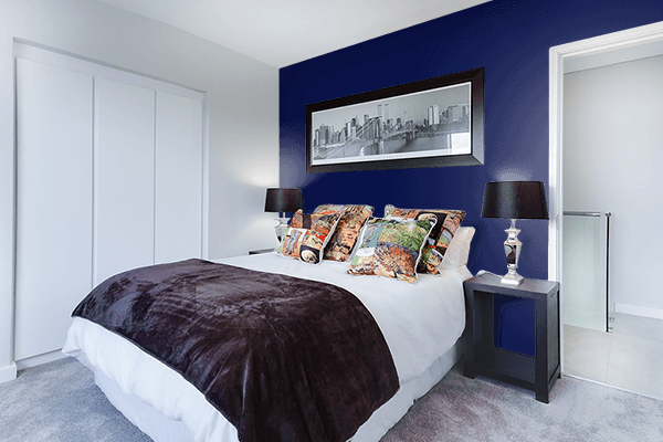 Pretty Photo frame on Peacock Navy color Bedroom interior wall color