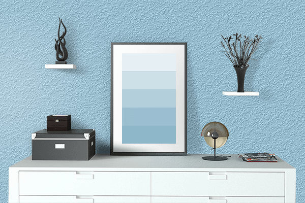 Pretty Photo frame on Angel Blue color drawing room interior textured wall