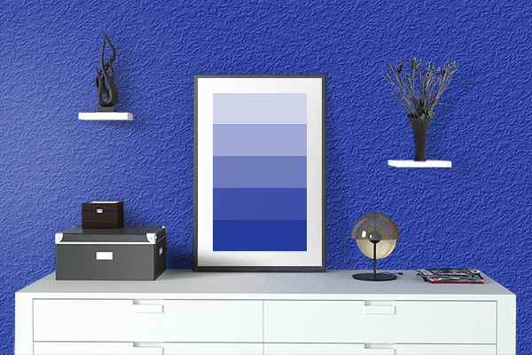 Pretty Photo frame on Peacock Blue color drawing room interior textured wall